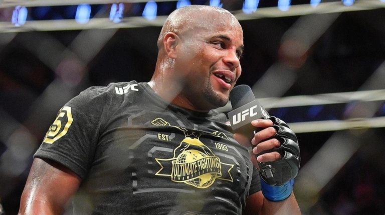 Daniel Cormier addresses the crowd after winning his