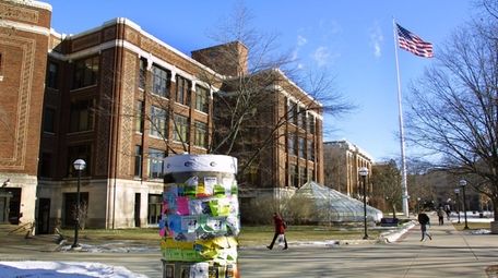Students walk across the University of Michigan campus