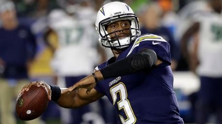 Chargers quarterback Geno Smith throws against the Seahawks