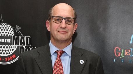 Former Knicks head coach Jeff Van Gundy walks