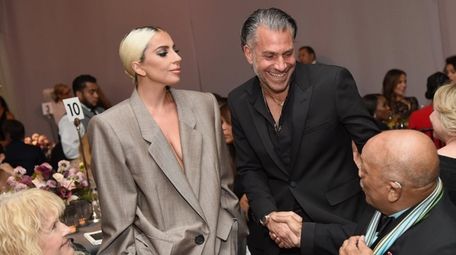 Lady Gaga and her fiance, Christian Carino, at