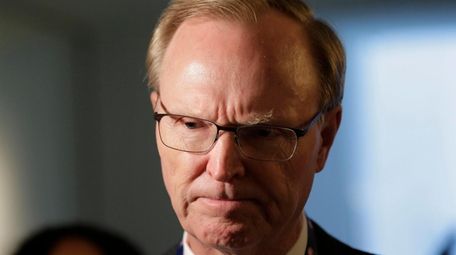 Giants owner John Mara speaks to reporters during