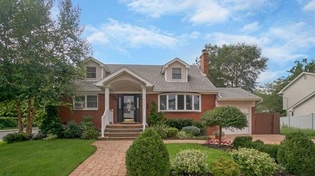 This North Bellmore home includes four bedrooms and