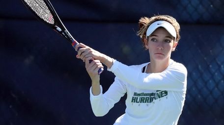 Westhampton's Rose Hayes makes a backhand return against