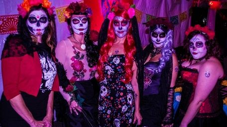 Attendees dressed in Sugar Skull regalia at last