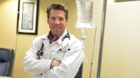 Dr. Jeff Vacirca poses at his office in