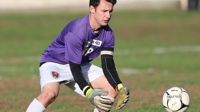Half Hollow Hills West's Benjamin Nacht (98) plays