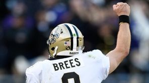 New Orleans Saints quarterback Drew Brees celebrates after