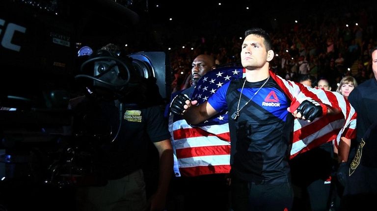 Chris Weidman enters the arena for his match