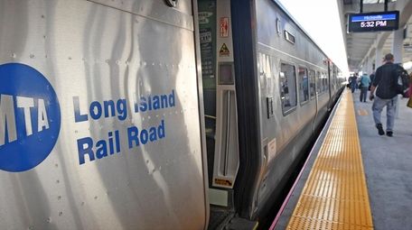 Commuters at the Hicksville LIRR station make their