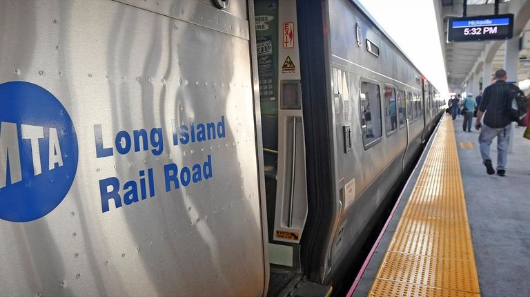 Commuters at the Hicksville LIRR station make their