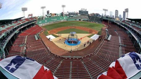 Bunting billows up in the wind at Fenway