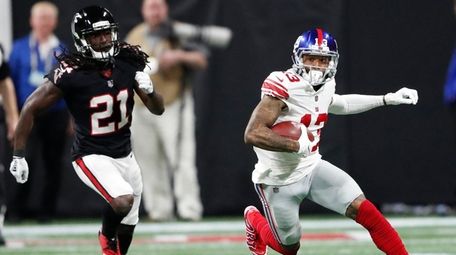 Odell Beckham Jr., right, finds some open space