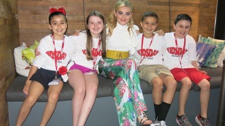 Actress Meg Donnelly with Kidsday reporters, from left,