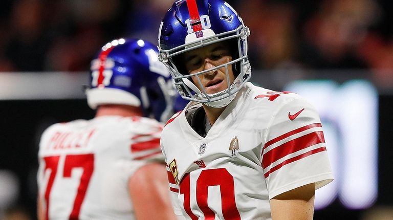Eli Manning #10 of the Giants reacts after