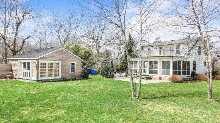 This four-bedroom, three-bath farmhouse is next to almost