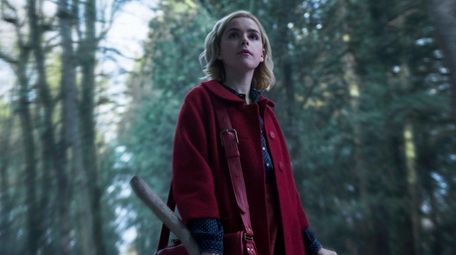 Kiernan Shipka must decide between the witch world