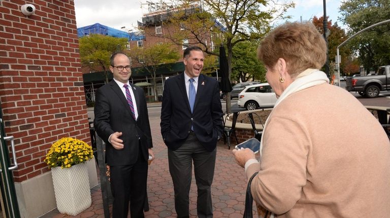 Republican gubernatorial candidate Marc Molinaro, center, in Garden