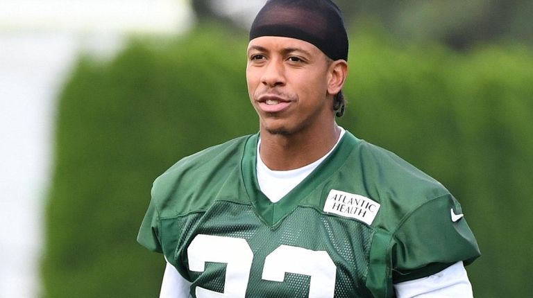 Jets cornerback Trumaine Johnson looks on during warmups