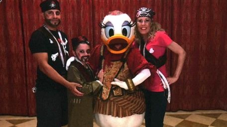 Kidsday reporter Joseph Buono with his parents, Matthew