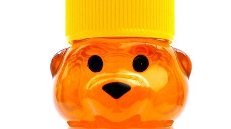 Miniature 2-ounce bottles of honey by Honey Gramz