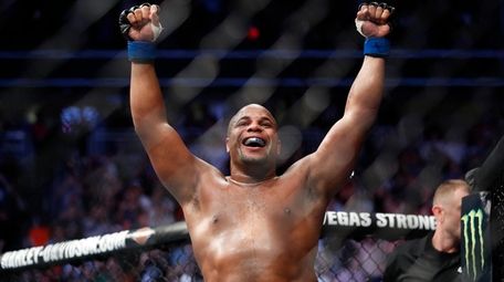 Daniel Cormier celebrates after defeating Stipe Miocic in