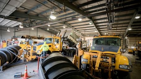 State DOT plow trucks are prepped in Melville