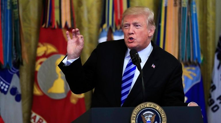 President Donald Trump speaks at a reception commemorating