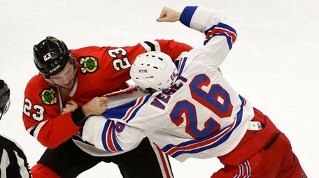 Chicago Blackhawks defenseman Brandon Manning and Rangers left