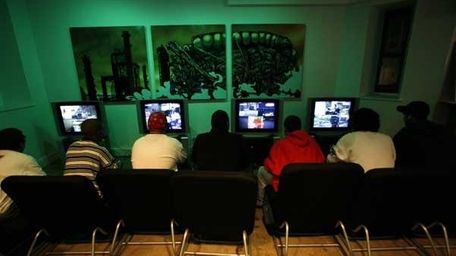 Players are seen in the thick of the