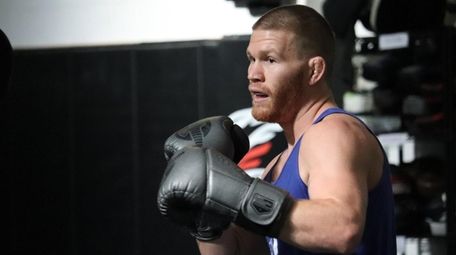 Huntington's Matt Frevola hits pads on Thursday, Oct.