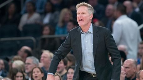 Golden State Warriors head coach Steve Kerr reacts