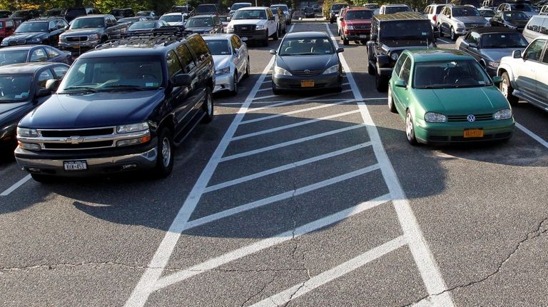 Commuters fill the parking lot at the LIRR