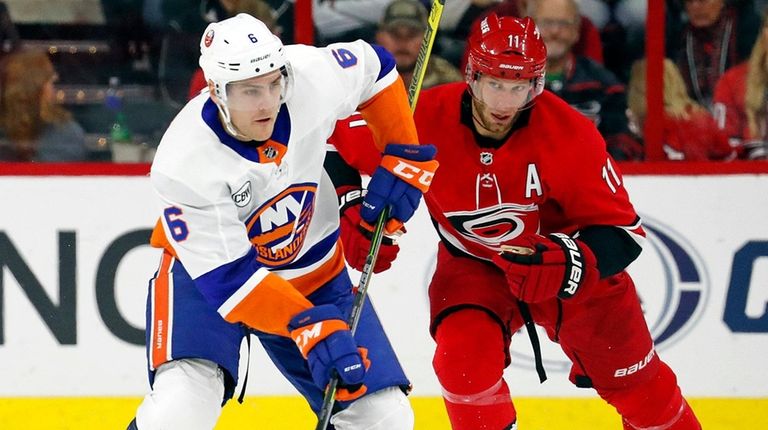 New York Islanders' Ryan Pulock (6) takes the