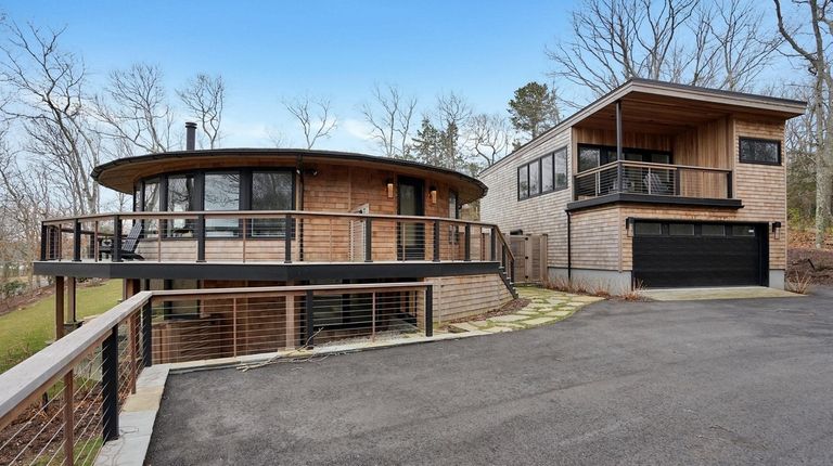 This .67-acre Hampton Bays property has a two-car