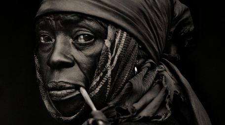 Dana Gluckstein's "Woman With Pipe, Traditional Medicinal Plant