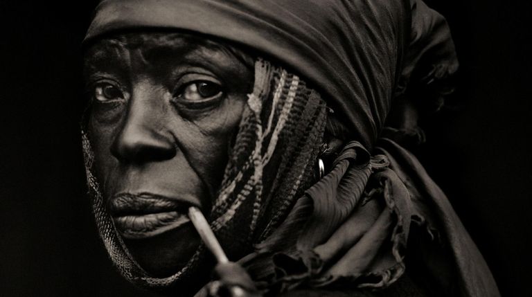 Dana Gluckstein's "Woman With Pipe, Traditional Medicinal Plant