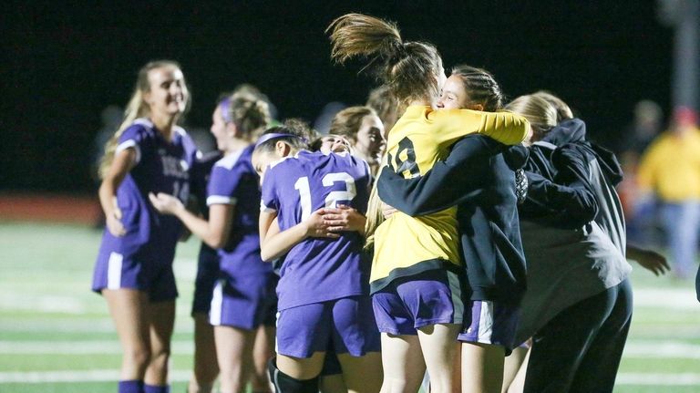Islip girls soccer team players celebrate their win