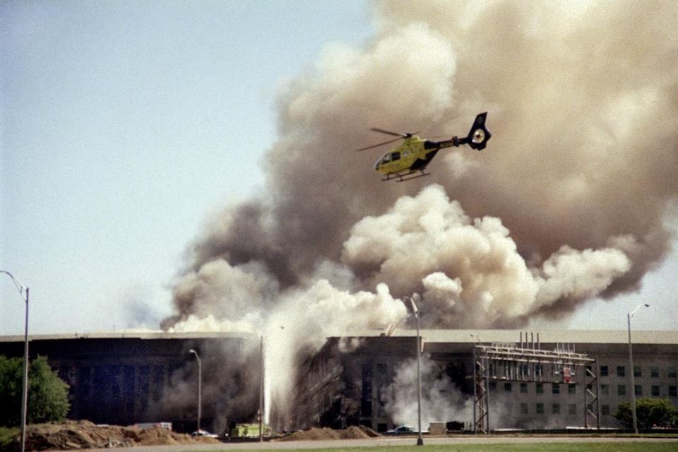 A helicopter flies over the Pentagon in Washington