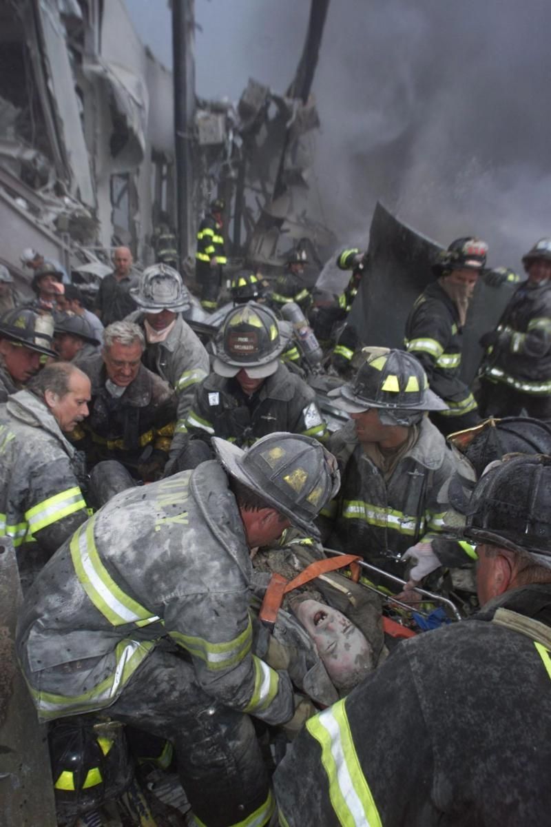 Firefighter Armondo Reno screams in pain during his