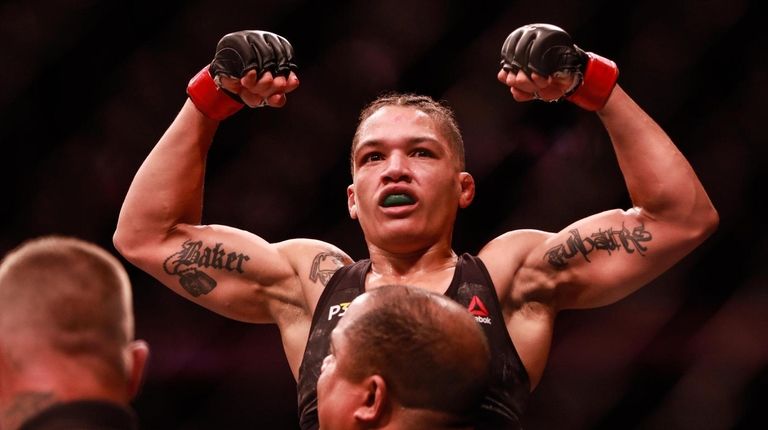 Sijara Eubanks celebrates after defeating Roxanna Modafferi by