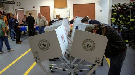 Voters cast their ballots at the Eatons Neck