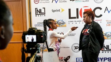 Long Island Girl Talk students Qianna Thomas, 10,