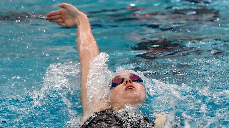 Port Jefferson's Kyra Sommerstad swims in the finals