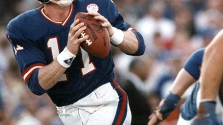 9. PHIL SIMMS, Quarterback, 1979-93A controversial first-round pick
