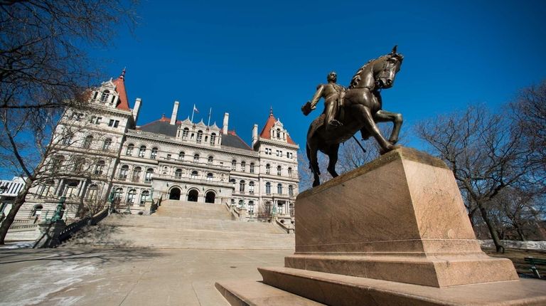 A statue stands in front of the New