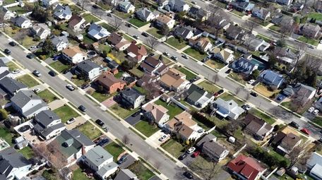 Aerial views of suburbs in Levittown taken April