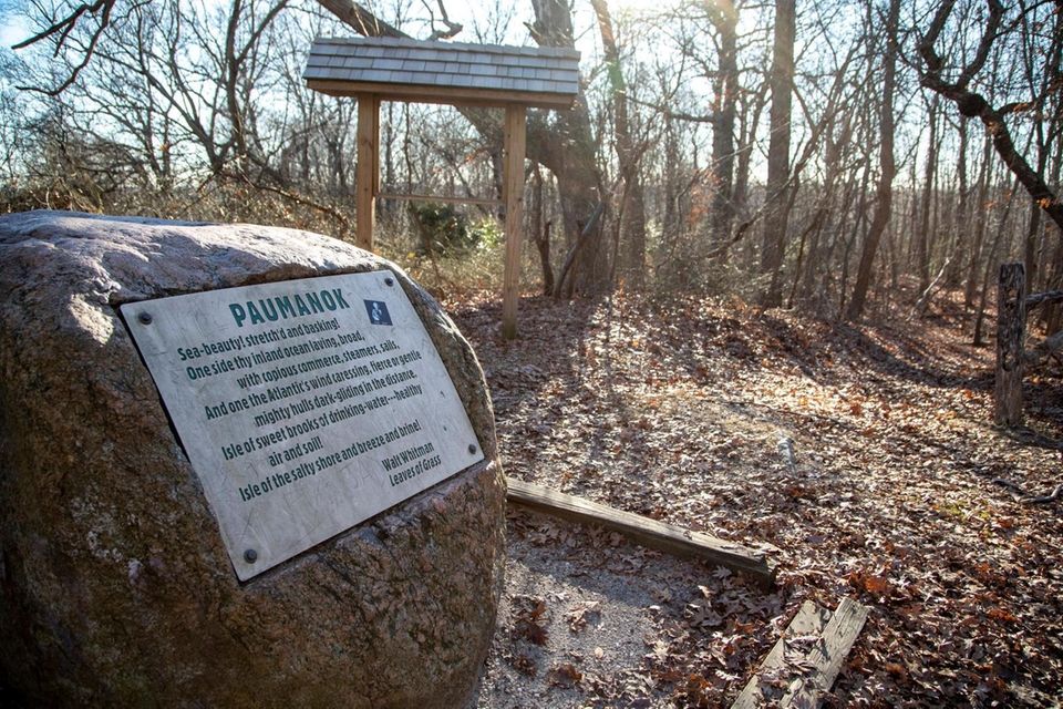 A boulder with a poem by Walt Whitman,
