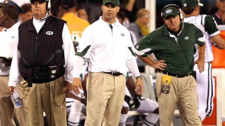 Sal Alosi, center, stands next to a shocked