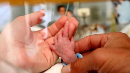 A baby in the Neonatal Intensive Care Unit
